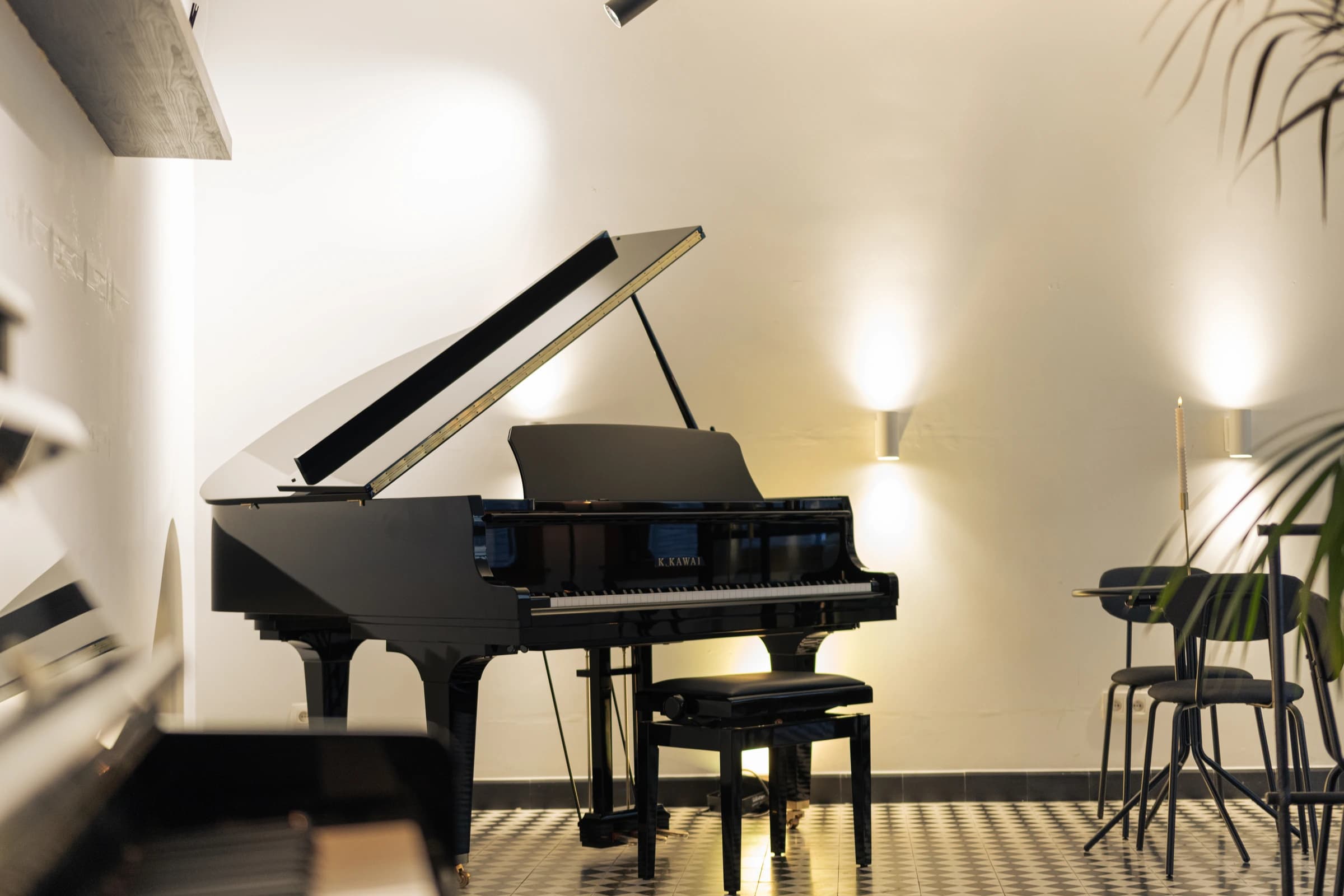 Black grand piano in the piano experience centre